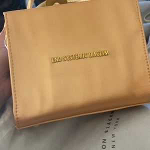 Brandon Blackwood Gold “End Systemic Racism” Mini bag
